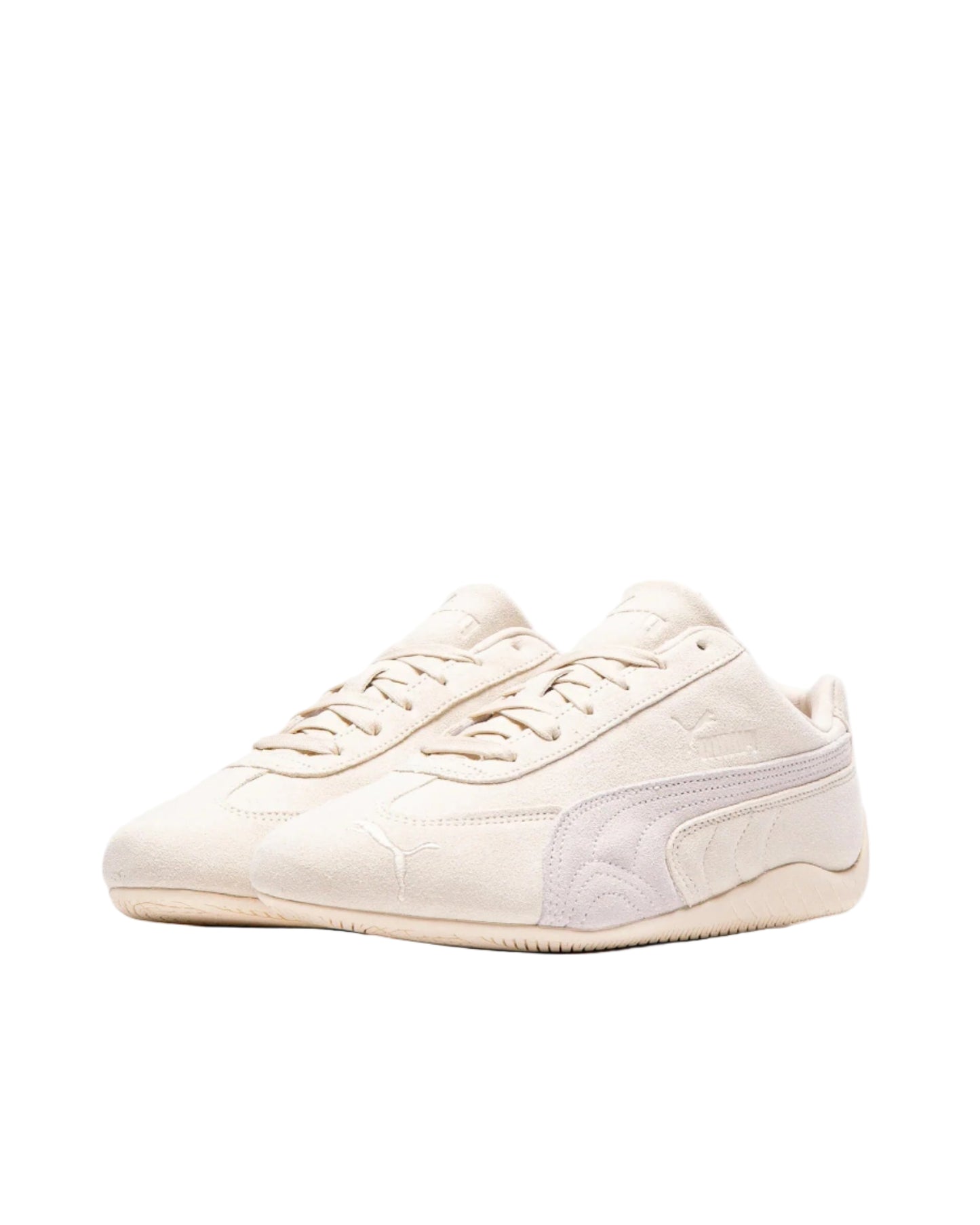 Pair of light-colored sneakers on a white background