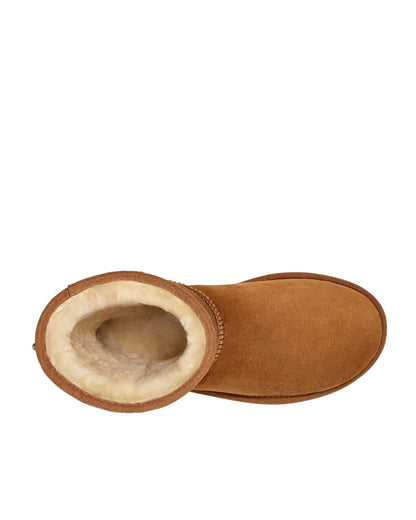 Brown suede boot with beige interior on a white background