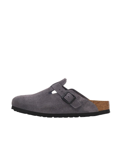 Gray suede clog shoe with a brown insole on a white background