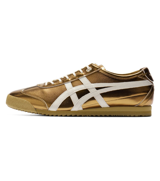 Gold and white sneaker on a white background