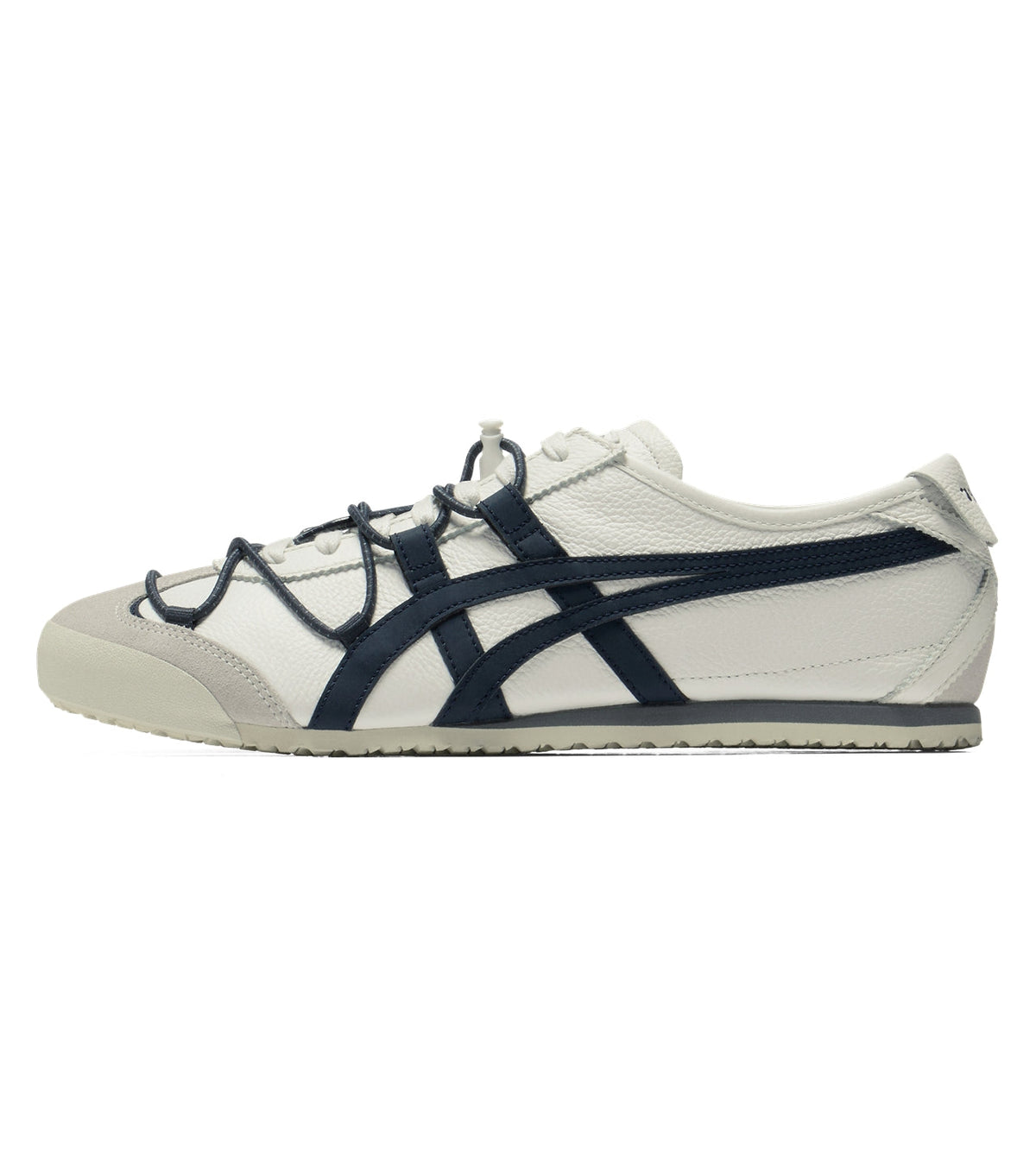 A classic low-top sneaker in off-white leather with navy blue stripes and laces, shown in a side profile on a white background.