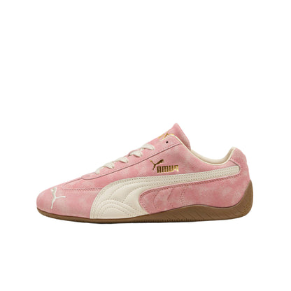 Pink Puma sneaker on a light gray background
