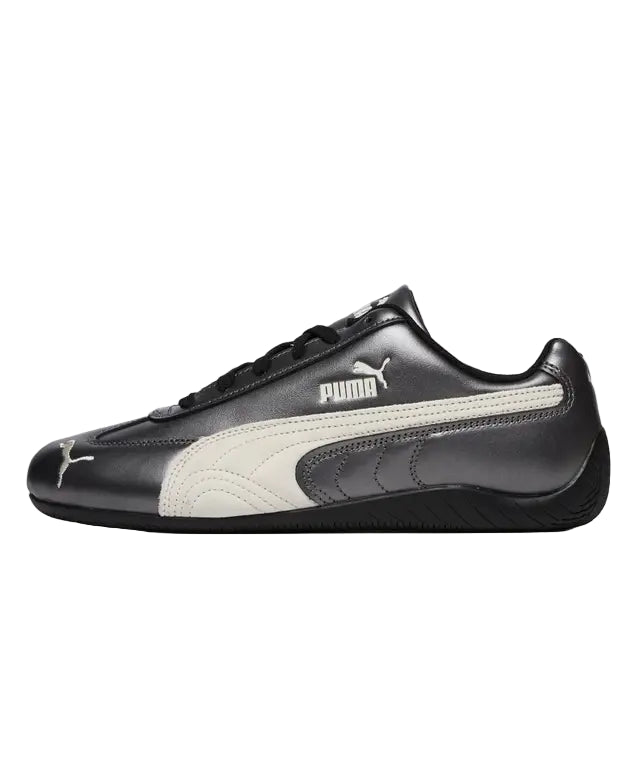 Black and white Puma sneaker on a white background