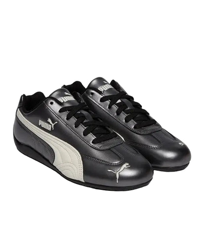 Pair of black and gray Puma sneakers on a white background