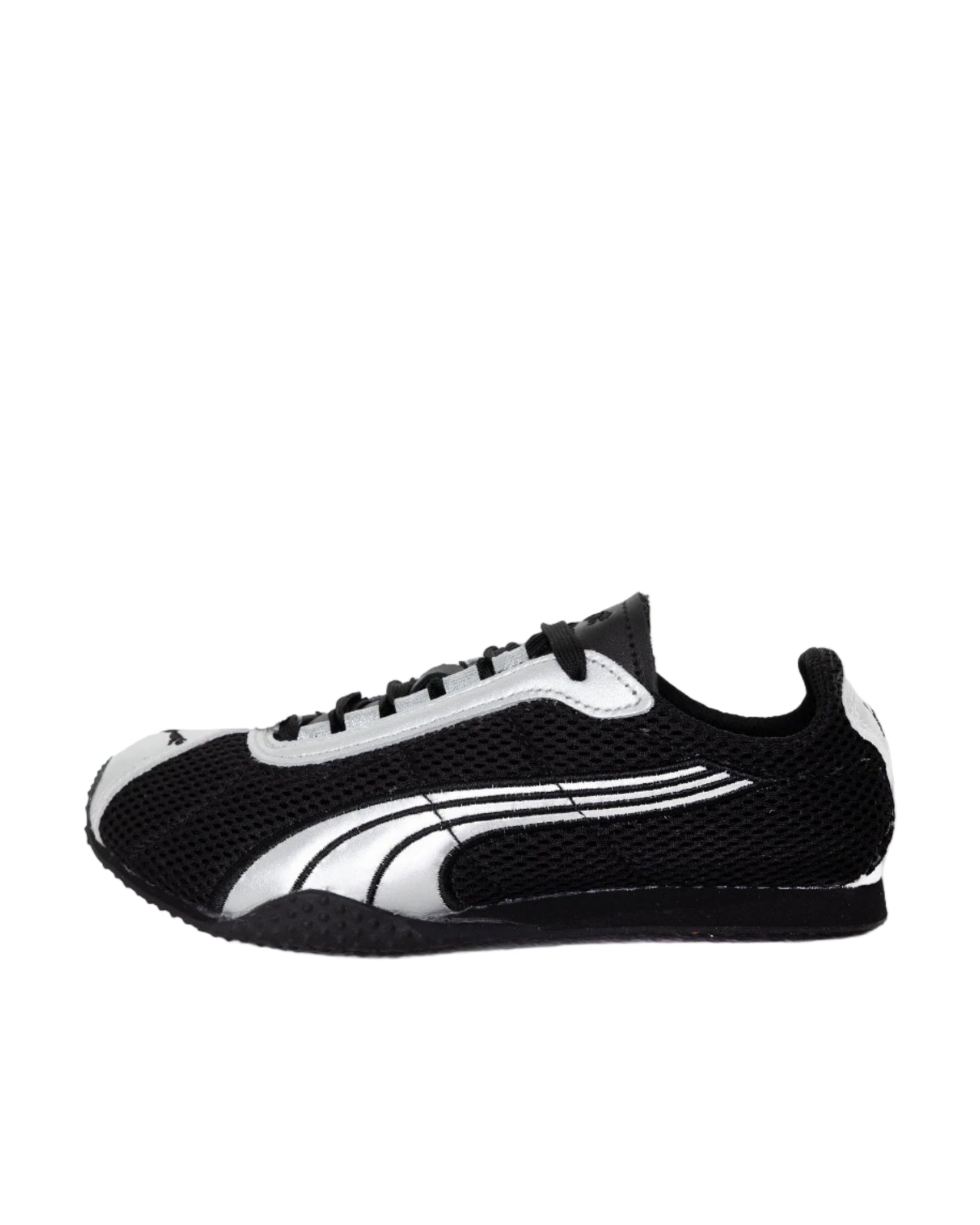 Black and white sneaker on a light gray background