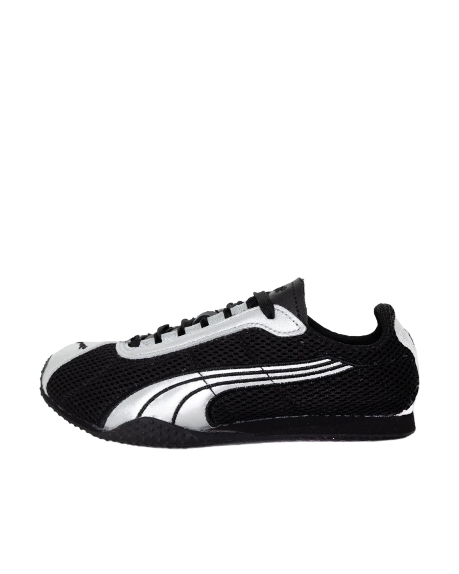 Black and white sneaker on a light gray background