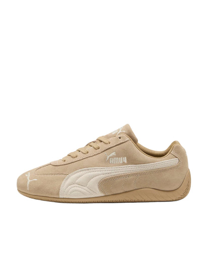 Beige sneaker with Puma logo on a white background