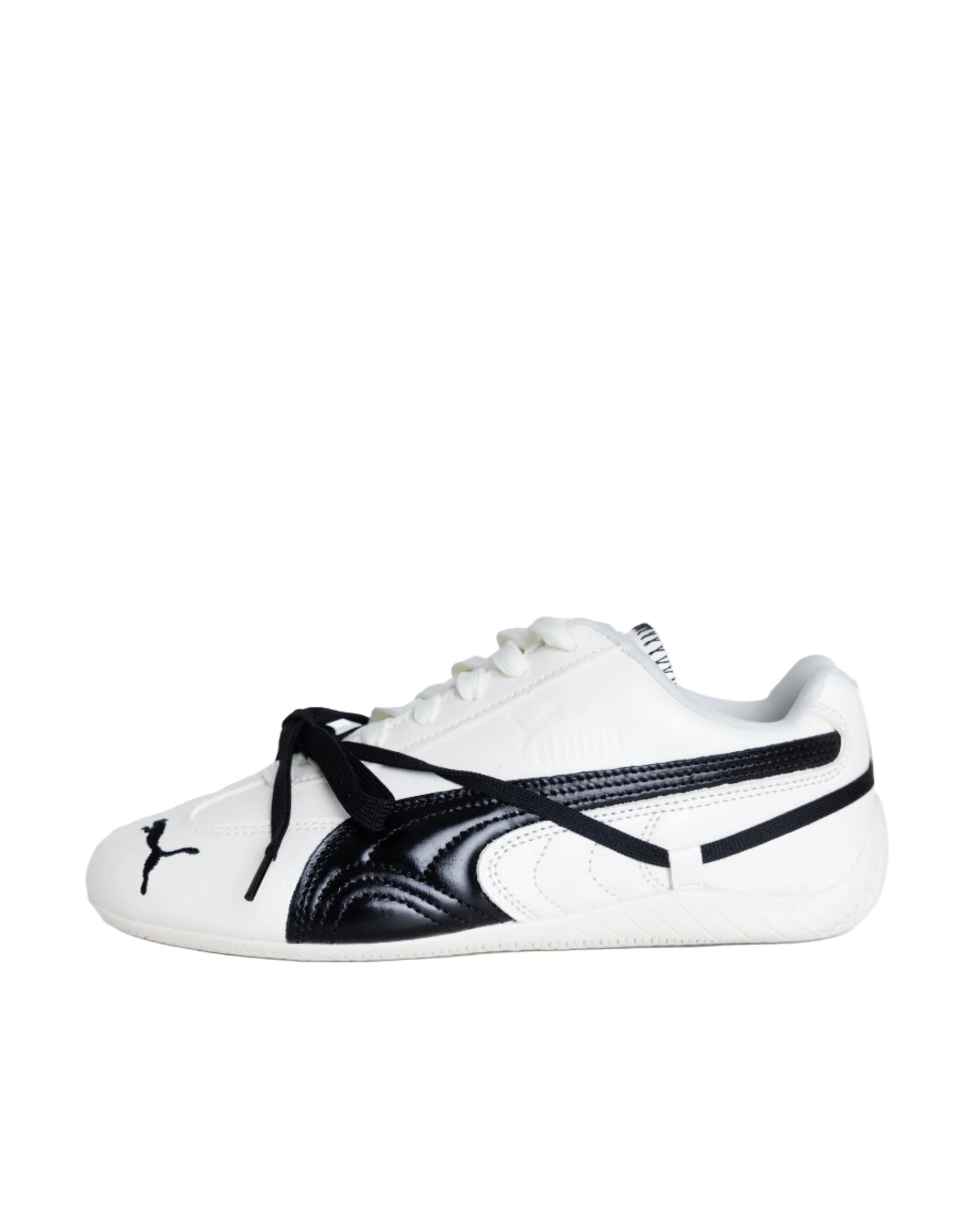 White and black sneaker with a prominent logo on a white background