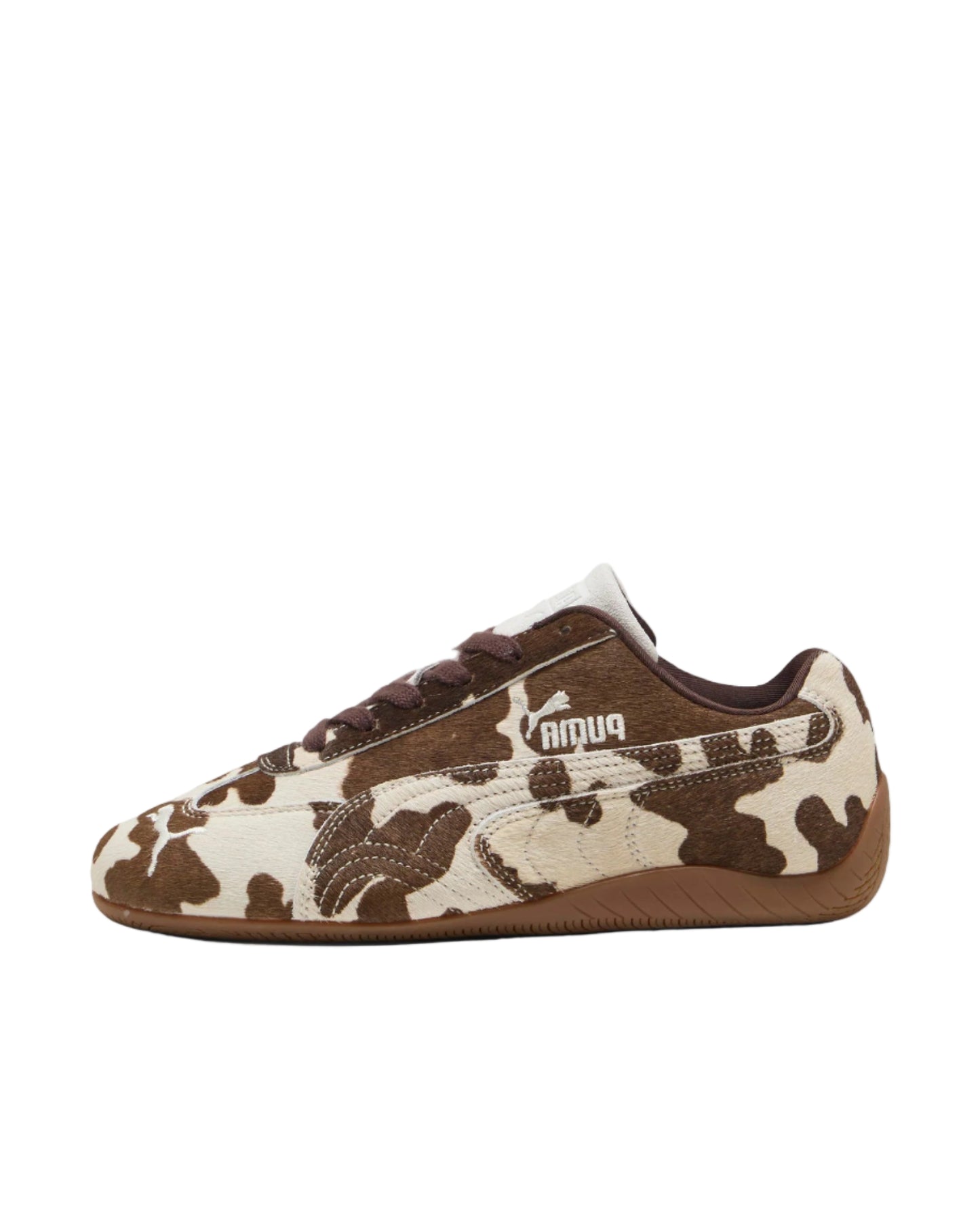 Brown and white camouflage sneaker with Puma logo on a white background
