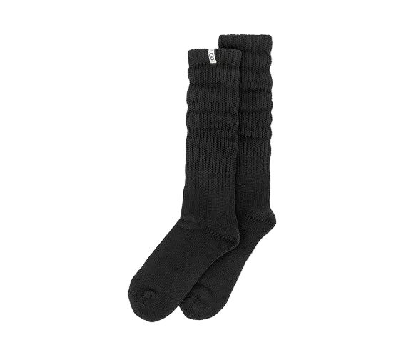 Pair of black socks on a light gray background