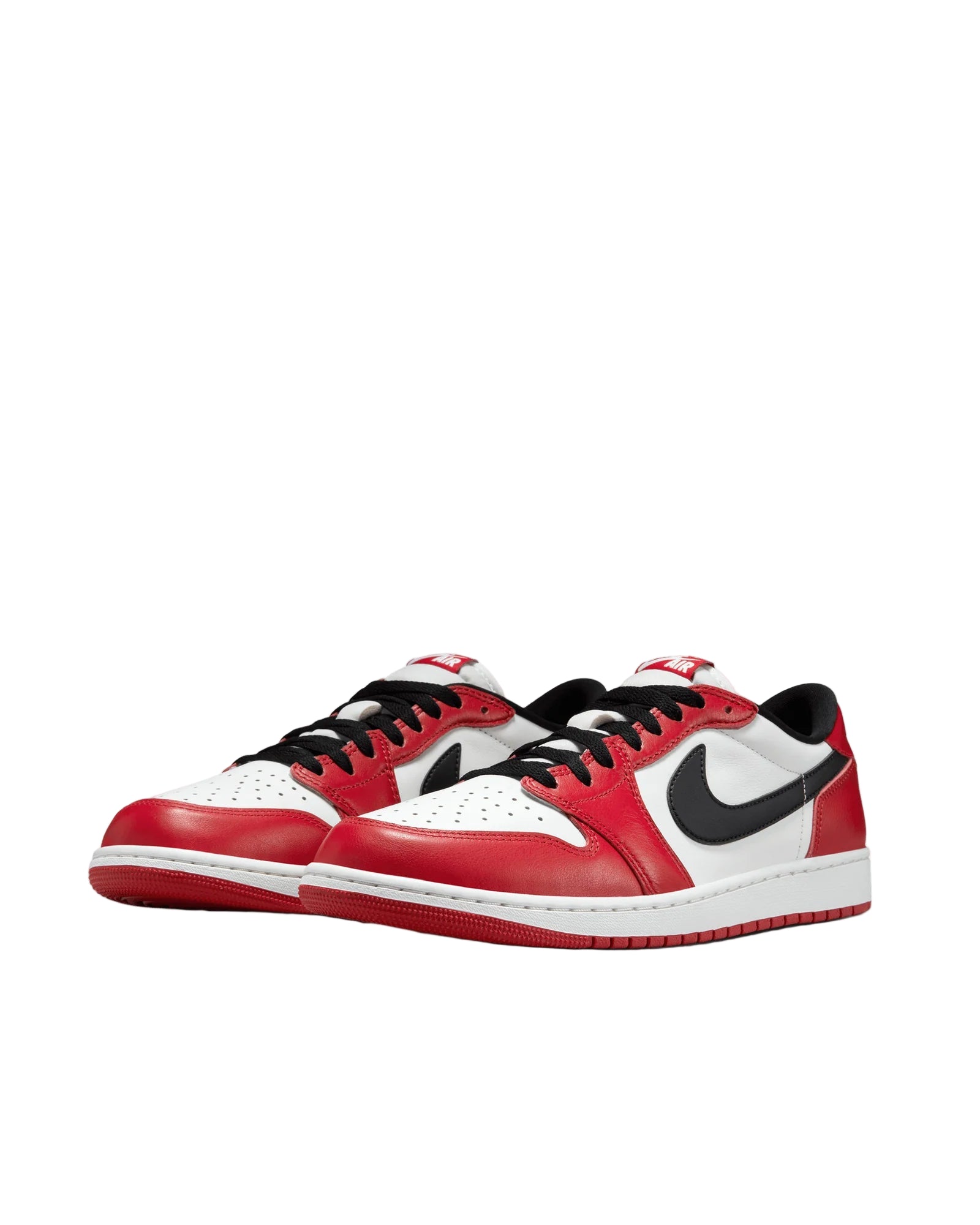 Red, white, and black sneakers on a white background