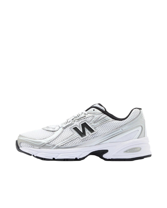 White athletic shoe with black accents on a white background