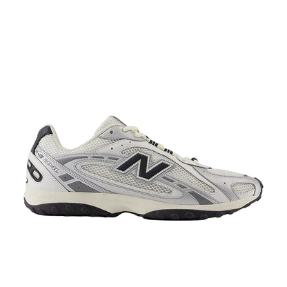 Gray athletic shoe with black accents on a white background
